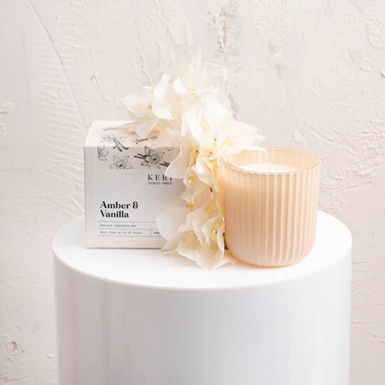 Fluted pillar candle on a plynth